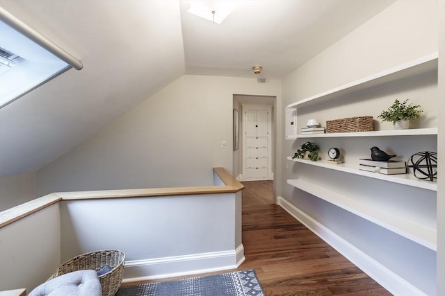 61 Crescent St Unit 6, Northampton, MA 01060 - interior space featuring dark wood-style floors, lofted ceiling, an upstairs landing, and baseboards
