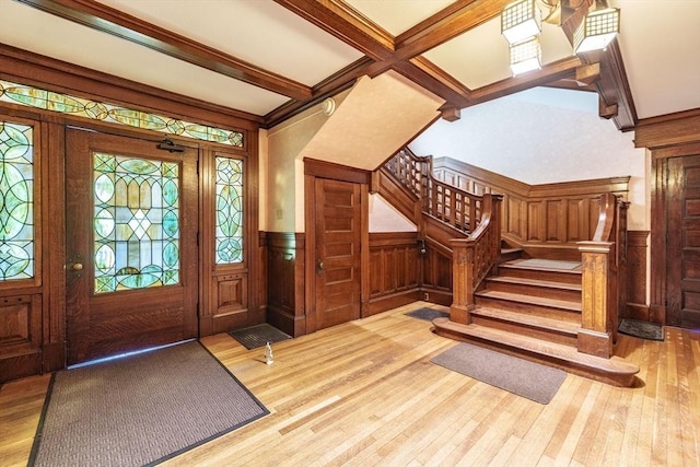 61 Crescent St Unit 6, Northampton, MA 01060 - foyer with hardwood / wood-style flooring, stairs, wainscoting, and beamed ceiling