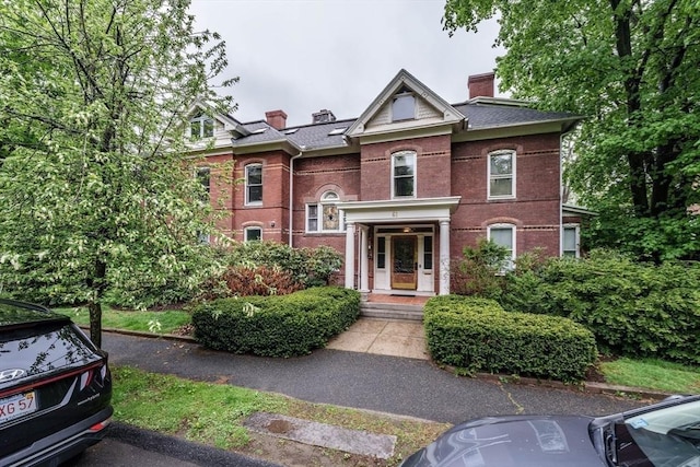 61 Crescent St Unit 6, Northampton, MA 01060 - view of front of house featuring a chimney and brick siding