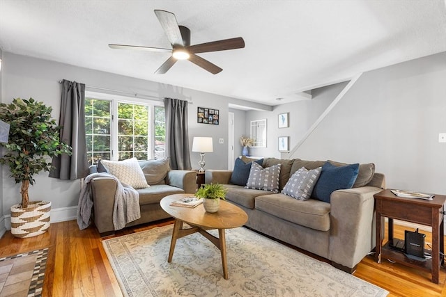 212 Broadway St, Wakefield, MA 01880 - living area with light wood finished floors, a ceiling fan, and baseboards