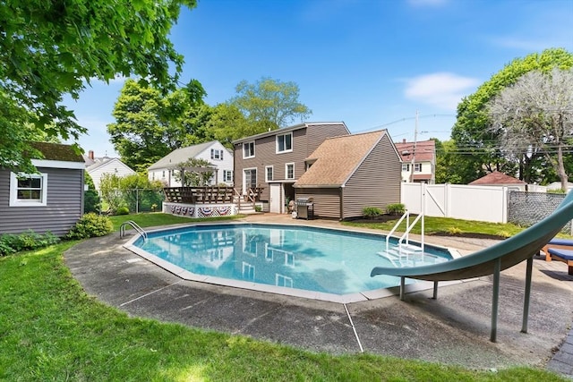 212 Broadway St, Wakefield, MA 01880 - view of pool featuring a water slide and a deck