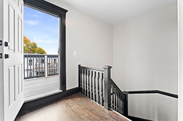 staircase featuring hardwood / wood-style flooring