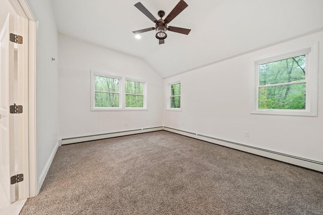 unfurnished room featuring a ceiling fan, light carpet, baseboards, and lofted ceiling