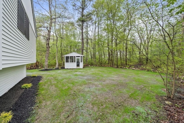 view of yard with a sunroom