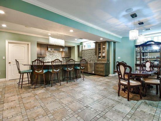 3 Regency Rdg, Andover, MA 01810 - dining space with a chandelier, ornamental molding, a bar, recessed lighting, and inlaid floor details