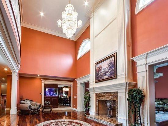 3 Regency Rdg, Andover, MA 01810 - building lobby featuring a towering ceiling and ornamental molding