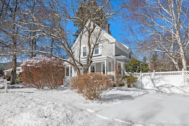 view of snow covered property