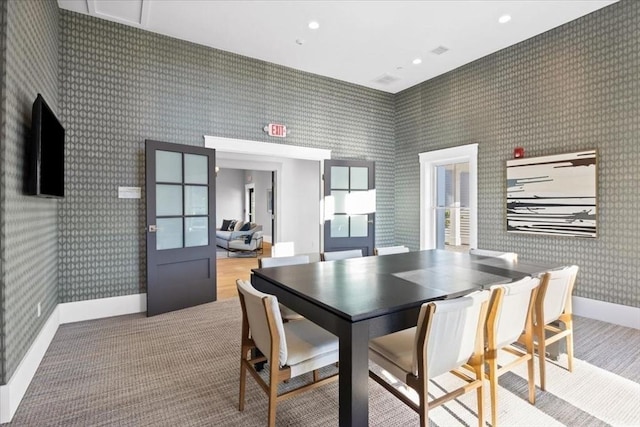 dining space featuring baseboards, recessed lighting, and wallpapered walls