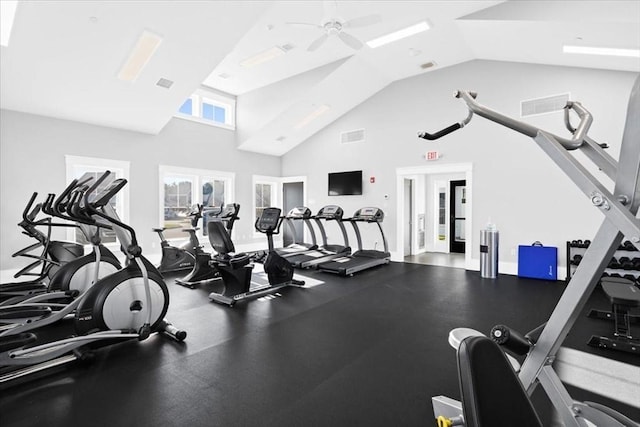 exercise room featuring visible vents, vaulted ceiling, a ceiling fan, and french doors