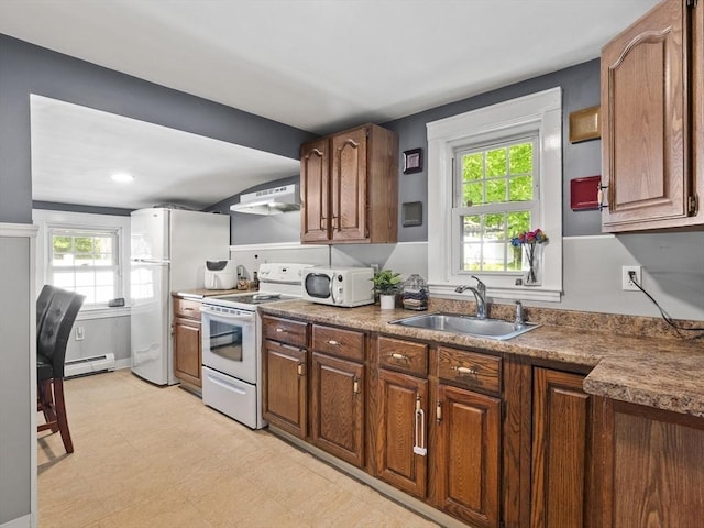307 Boutelle St, Fitchburg, MA 01420 - kitchen featuring white appliances, ventilation hood, a baseboard radiator, and plenty of natural light