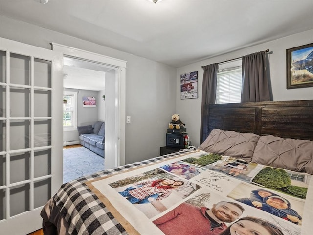 307 Boutelle St, Fitchburg, MA 01420 - bedroom with a baseboard heating unit