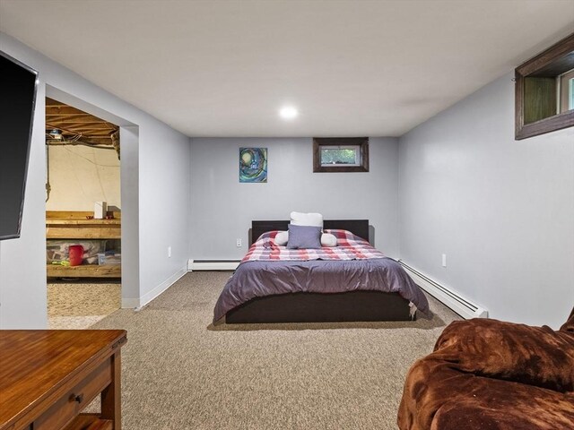 307 Boutelle St, Fitchburg, MA 01420 - carpeted bedroom with baseboard heating and a baseboard heating unit