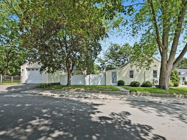 307 Boutelle St, Fitchburg, MA 01420 - obstructed view of property with asphalt driveway
