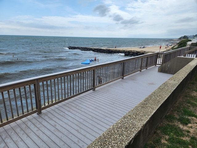 wooden terrace with a water view