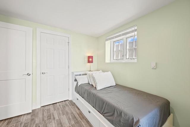 bedroom featuring hardwood / wood-style flooring