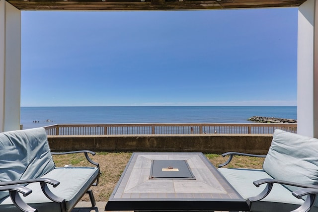 view of patio featuring a water view