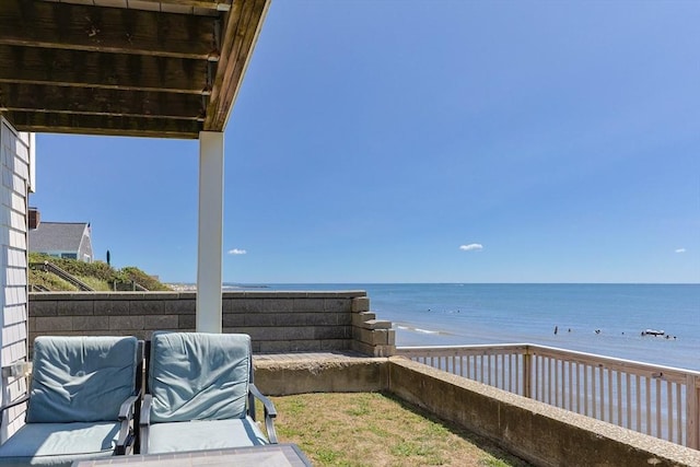 view of patio / terrace with a water view