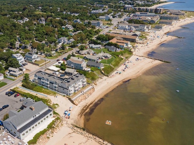 drone / aerial view with a view of the beach and a water view