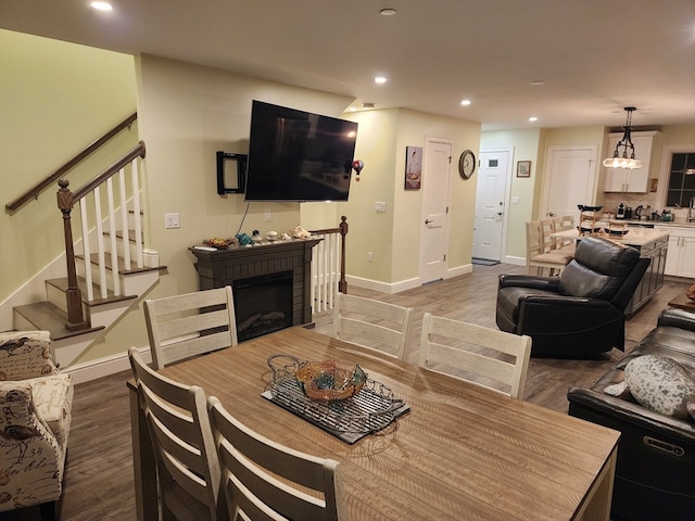 dining area featuring wood-type flooring