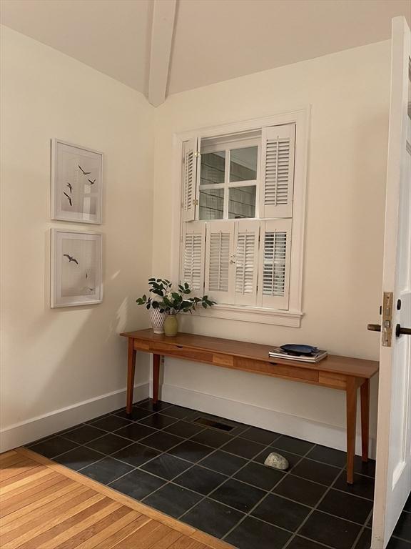 room details featuring wood finished floors and baseboards