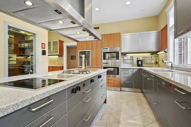 2 Azalea Way, Boxford, MA 01921 - kitchen with appliances with stainless steel finishes, exhaust hood, gray cabinets, light stone counters, and recessed lighting