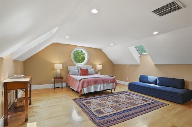 2 Azalea Way, Boxford, MA 01921 - bedroom with lofted ceiling, light wood finished floors, a skylight, and recessed lighting