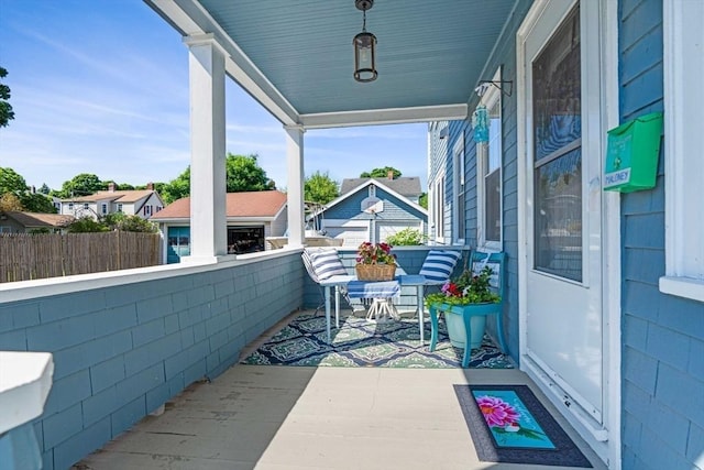 balcony featuring covered porch