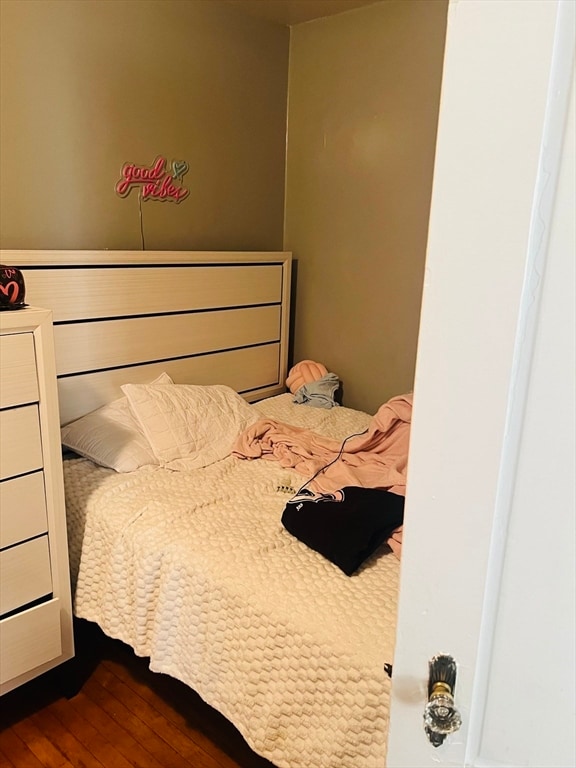 bedroom featuring wood-type flooring