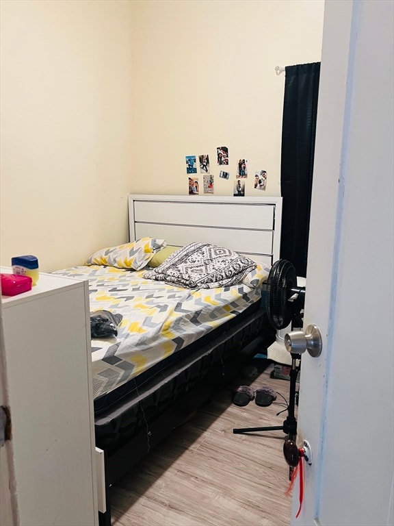 bedroom with light hardwood / wood-style flooring