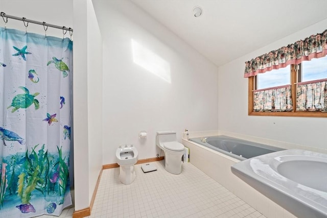 full bath with toilet, a bidet, a garden tub, vaulted ceiling, and a stall shower