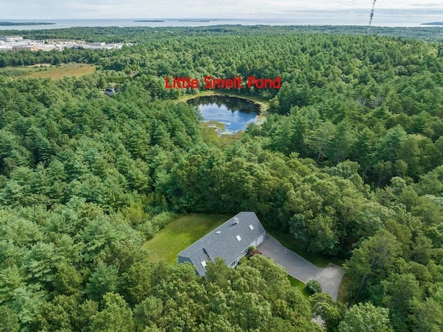 aerial view featuring a wooded view