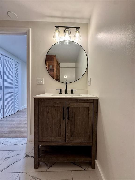 8 Melanie Ln, Mattapoisett, MA 02739 - bathroom featuring marble look tiles and vanity