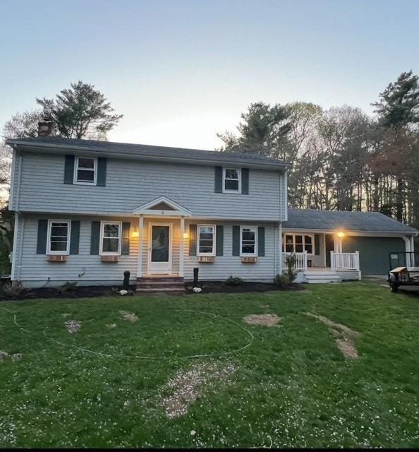 8 Melanie Ln, Mattapoisett, MA 02739 - colonial house featuring a chimney and a front yard