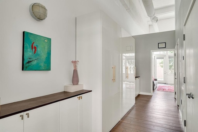 165 Chestnut Hill Ave Unit 3, Boston, MA 02135 - hall featuring wood-type flooring and a towering ceiling