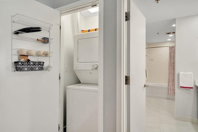 165 Chestnut Hill Ave Unit 3, Boston, MA 02135 - washroom with stacked washer / drying machine, marble finish floors, and recessed lighting