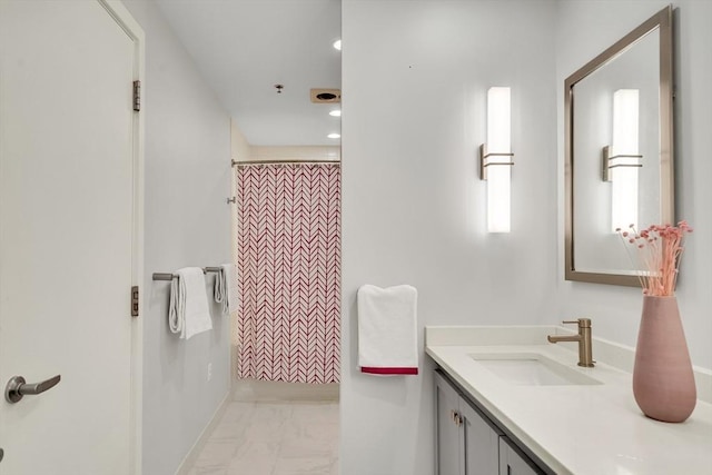 165 Chestnut Hill Ave Unit 3, Boston, MA 02135 - full bathroom with vanity, marble finish flooring, curtained shower, and recessed lighting