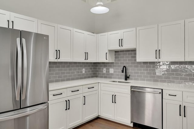 165 Chestnut Hill Ave Unit 3, Boston, MA 02135 - kitchen with stainless steel appliances, light countertops, and white cabinetry