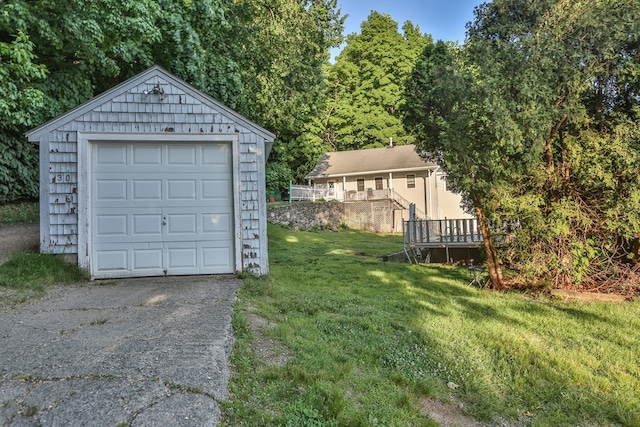 garage with a yard