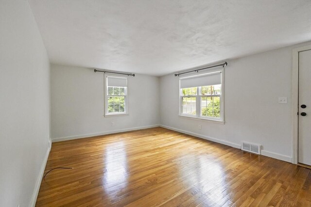 1652 Parker St, Springfield, MA 01128 - empty room with wood finished floors and baseboards