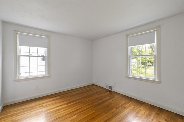 1652 Parker St, Springfield, MA 01128 - spare room with wood finished floors and baseboards