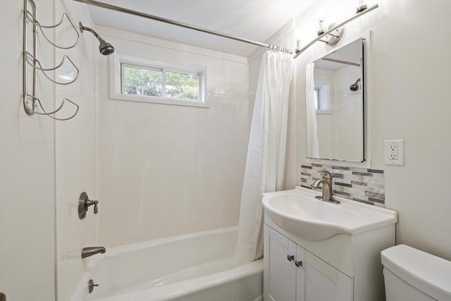 1652 Parker St, Springfield, MA 01128 - bathroom featuring decorative backsplash, toilet, shower / bath combination with curtain, and vanity