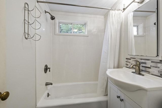 1652 Parker St, Springfield, MA 01128 - bathroom featuring shower / bath combo with shower curtain, backsplash, and vanity
