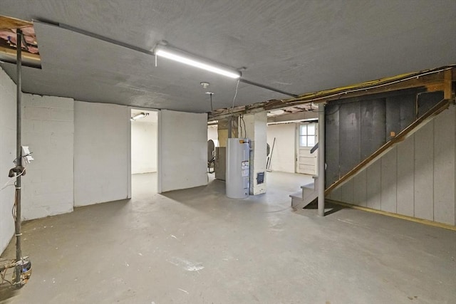 1652 Parker St, Springfield, MA 01128 - basement featuring water heater and stairs