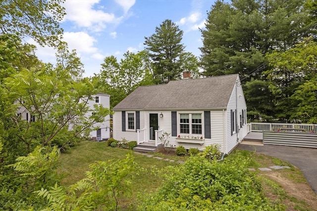 1652 Parker St, Springfield, MA 01128 - cape cod-style house with a chimney and a shingled roof