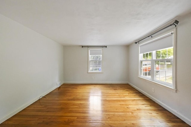 1652 Parker St, Springfield, MA 01128 - empty room featuring light wood-style floors and baseboards