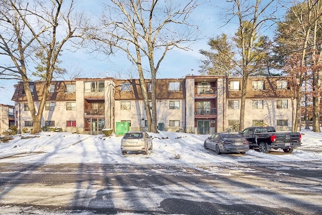 view of snow covered property