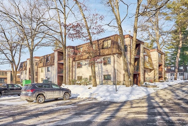 view of snow covered property