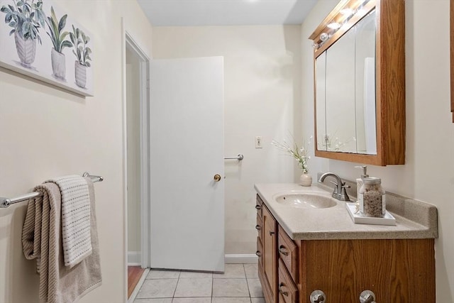 bathroom with vanity and tile patterned floors