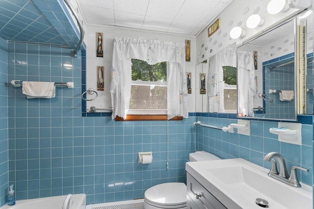 30 Stone St, Bellingham, MA 02019 - bathroom with plenty of natural light, vanity, a shower, tile walls, and a baseboard heating unit