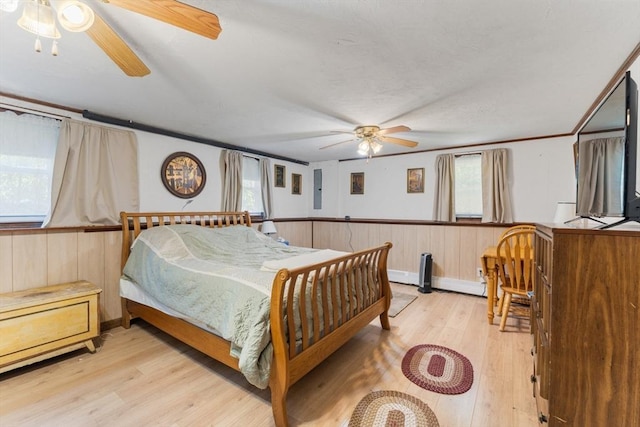 30 Stone St, Bellingham, MA 02019 - bedroom featuring light wood-style flooring, a wainscoted wall, wood walls, and ceiling fan
